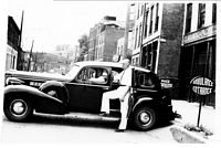 Al Green-driving and Ernie Virtue with Furlong Funeral car.jpg